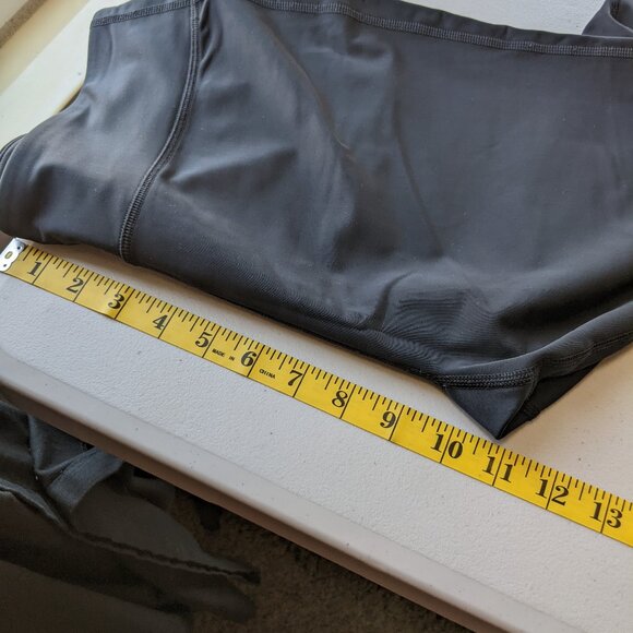 Under Armour black capri leggings with neon green accents - Picture 8 of 11